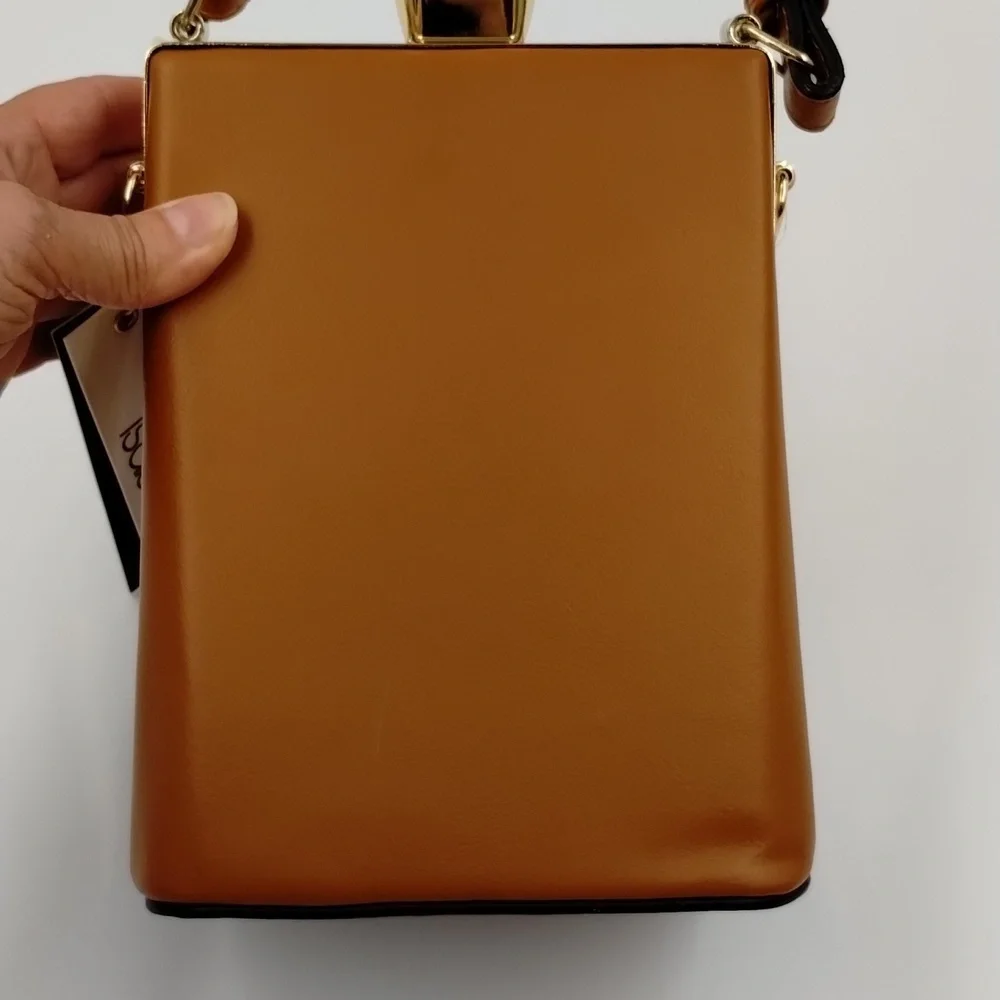 Sophisticated Brown Baby Bag with Gold Accents